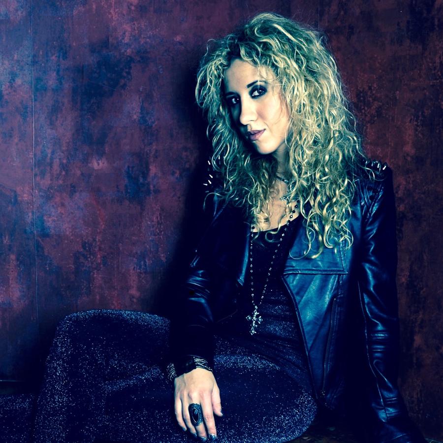 Electra in a studded leather jacket